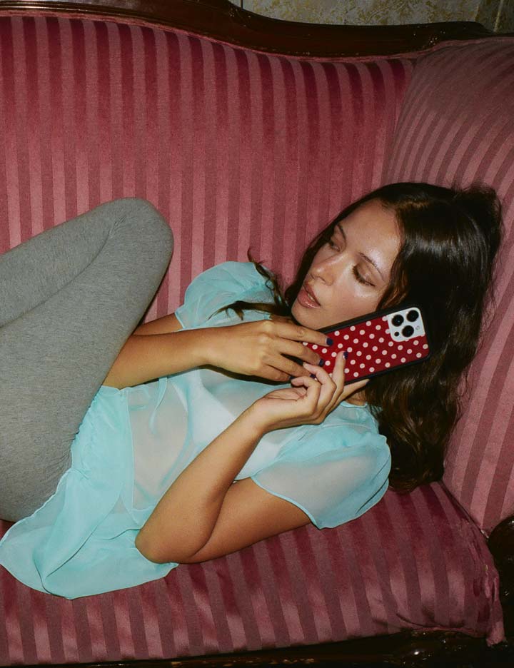 Lifestyle Image 02 Polka Dot Burgundy and Cream iPhone Case