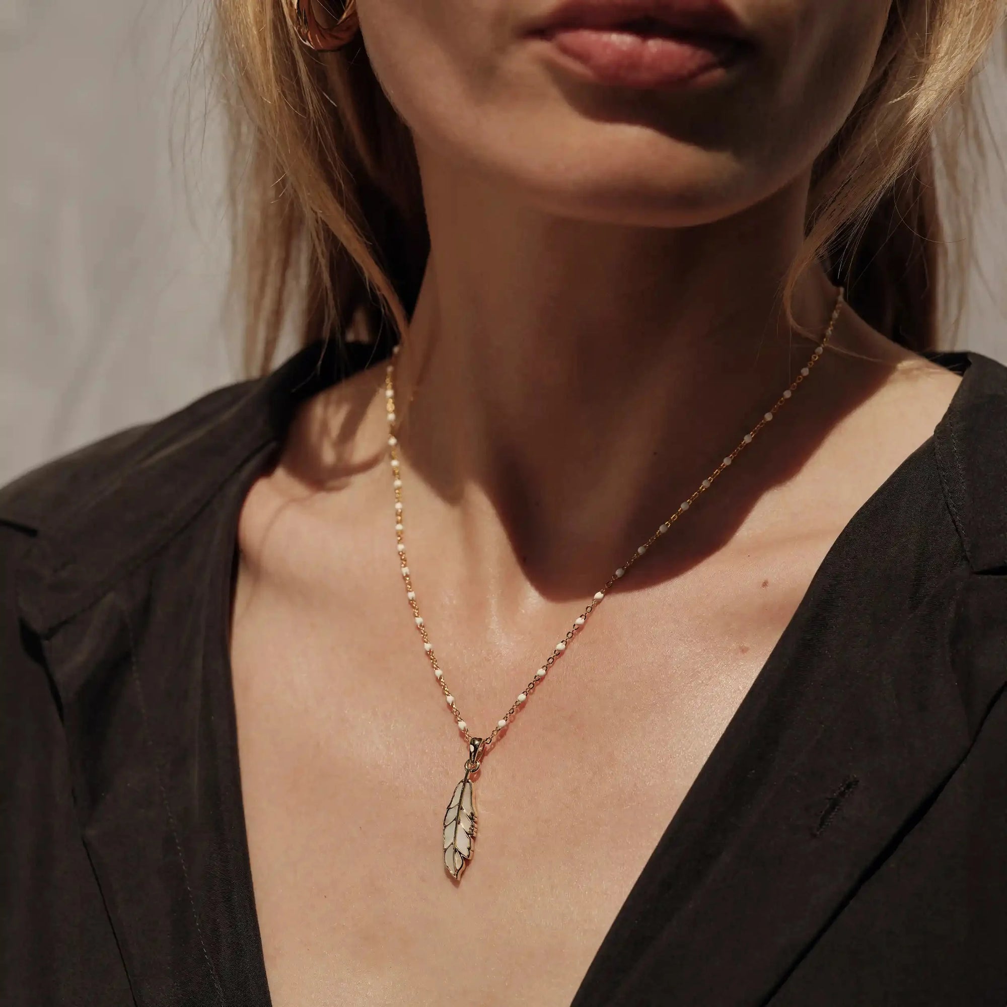 Awe Inspired - Mother of Pearl Feather White Enamel Necklace -