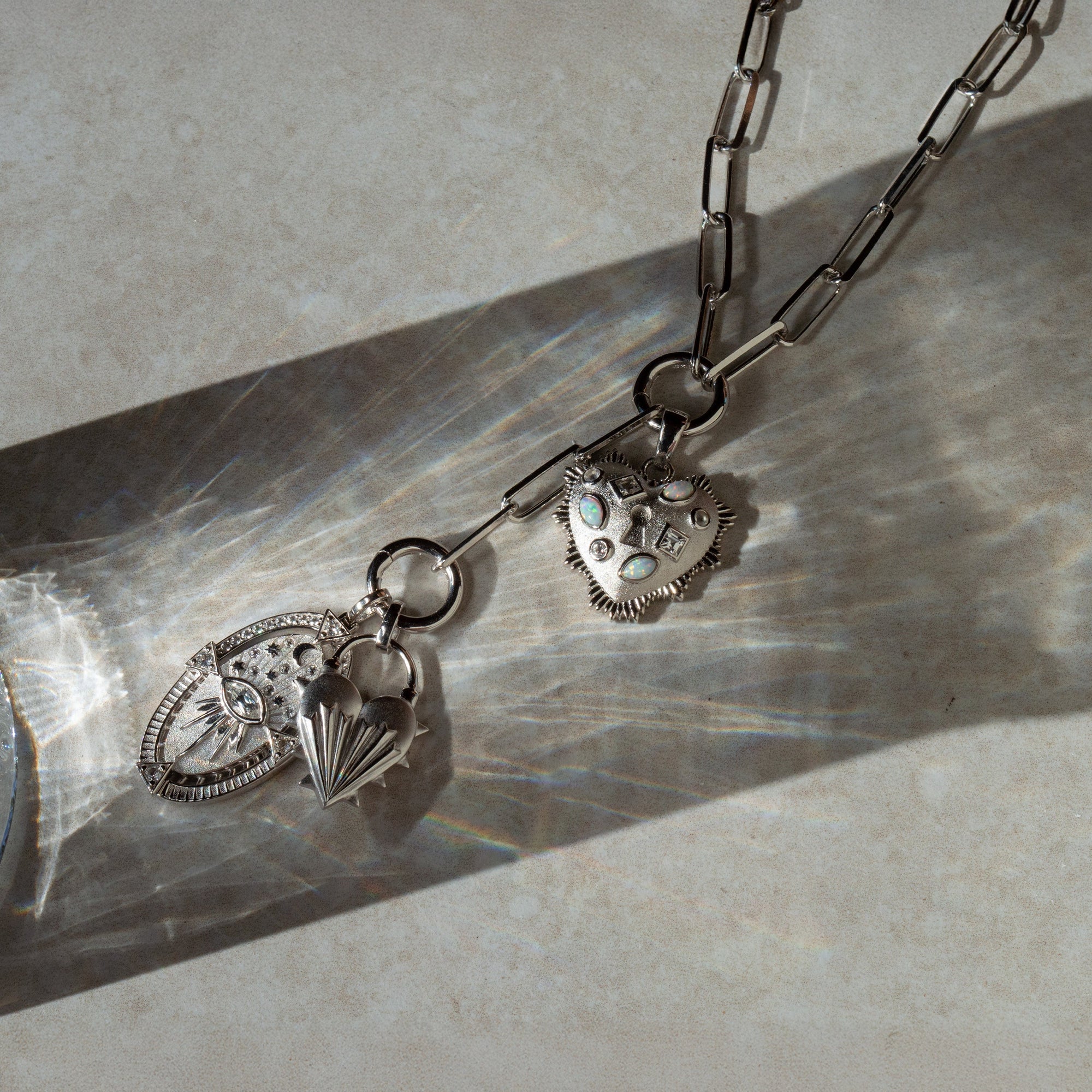 Awe Inspired - Blue Gemstone Locked Radiant Heart Pendant -